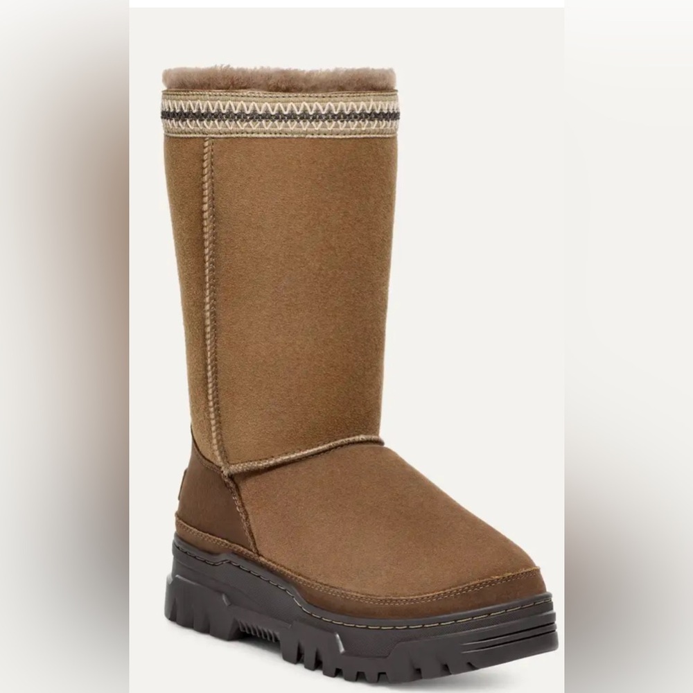 $240 Brand new in Box UGG Classic Tall TrailGazer
Boots Size 7 in Hickory